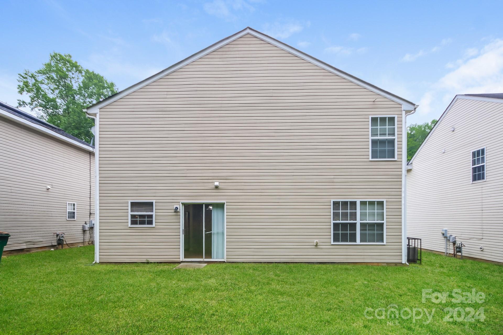2315 Gooseberry Road Charlotte, NC 28208 - Photo 22 of 22 a view of a house with a backyard