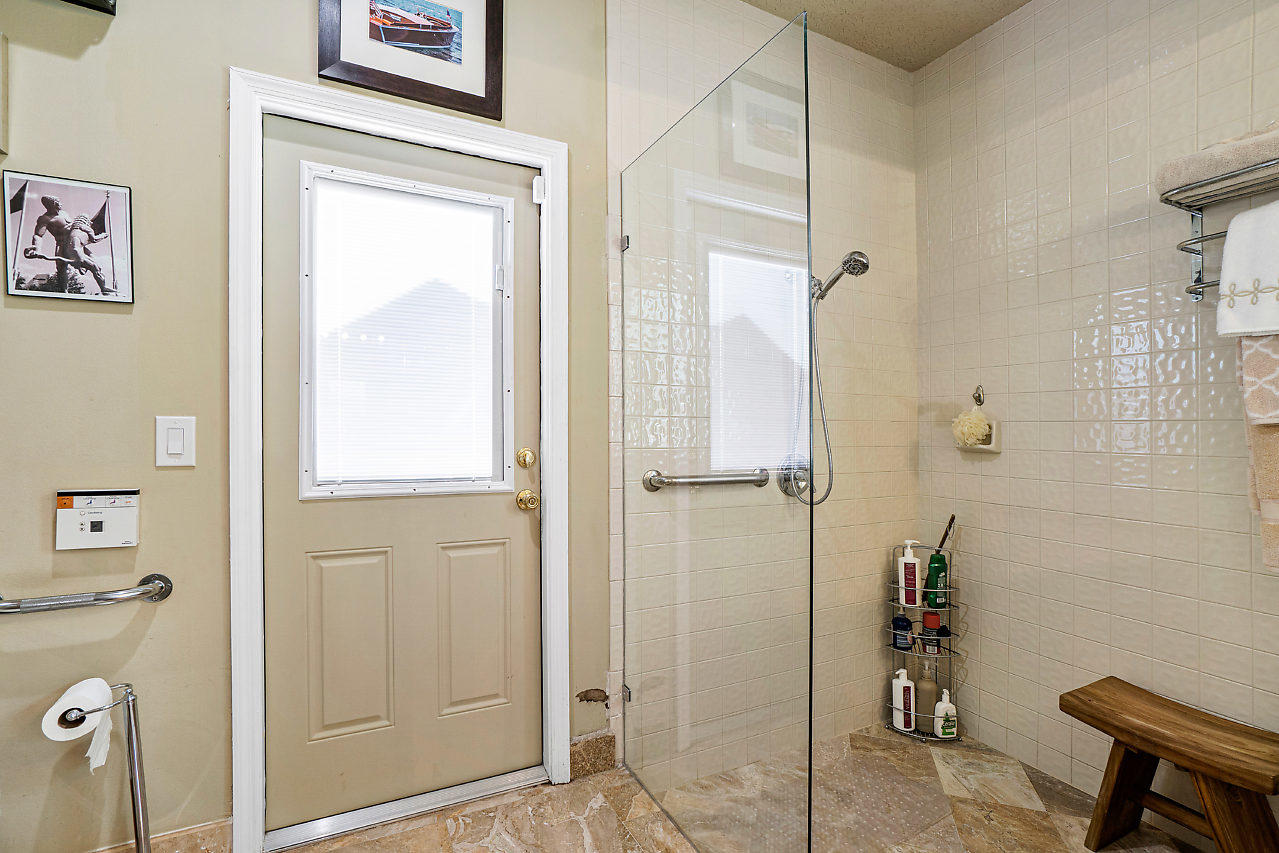 2410 Northwest 53rd Street Boca Raton, FL 33496 - Photo 21 of 25 a bathroom with a shower