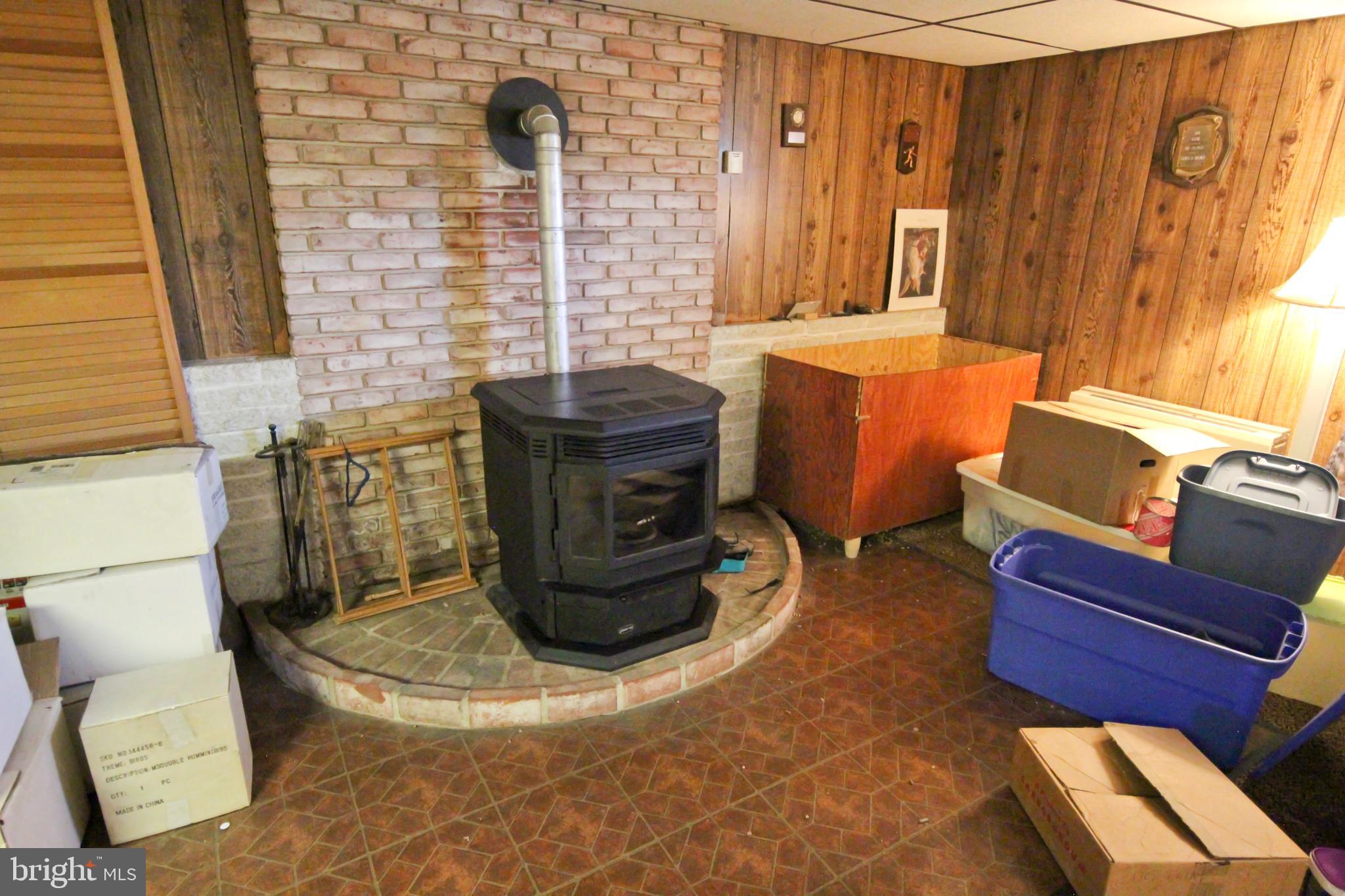 821 Geigertown Road Birdsboro, PA 19508 - Photo 6 of 6 Finished basement with pellet stove