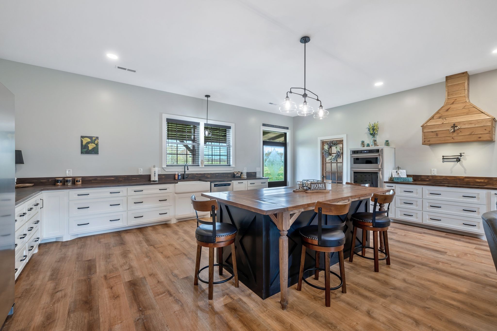 11010 Shelbyville Road Morrison, TN 37357 - Photo 12 of 44 a view of a dining room with furniture window and wooden floor