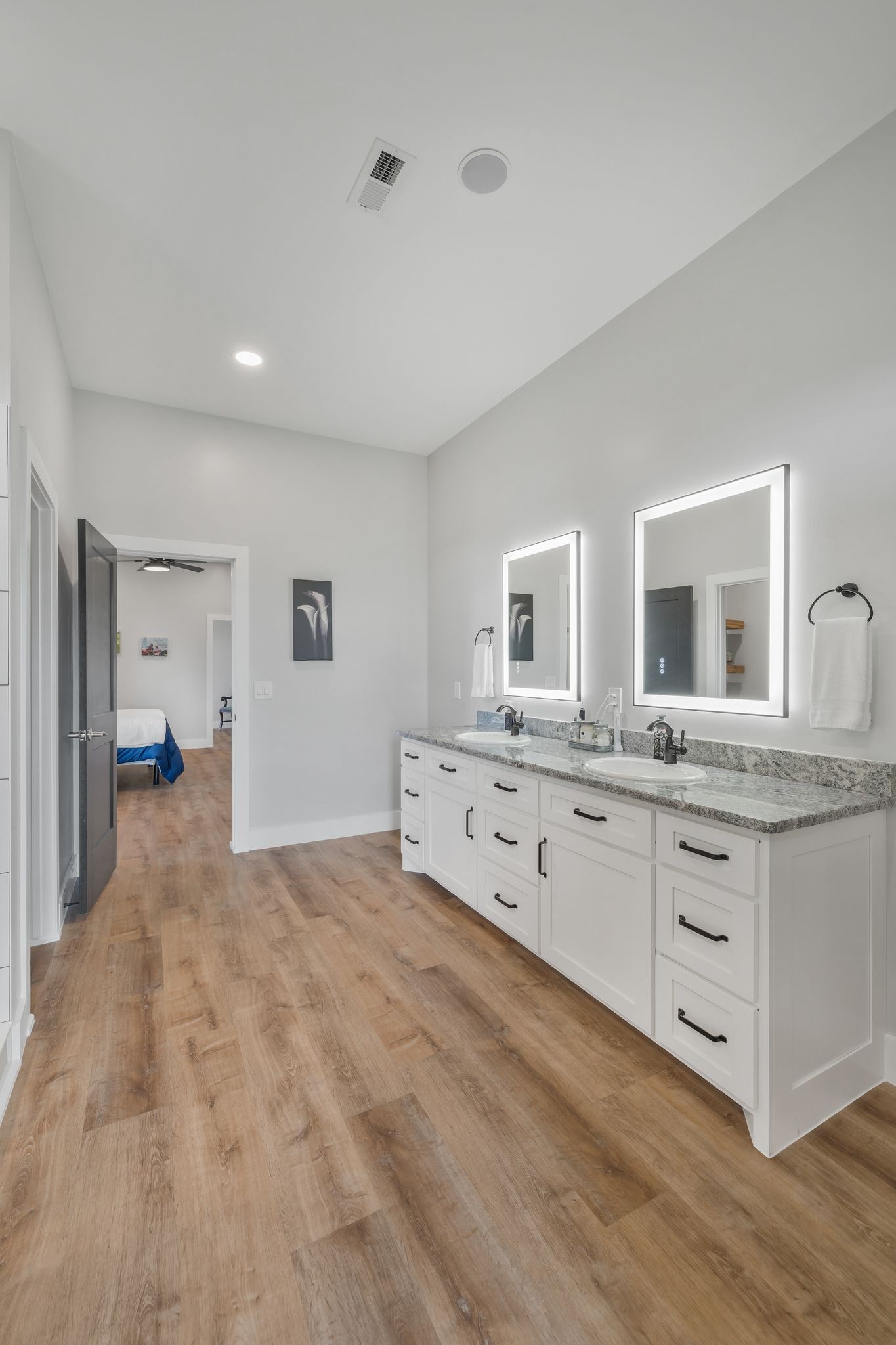 11010 Shelbyville Road Morrison, TN 37357 - Photo 17 of 44 a spacious bathroom with double vanity and a mirror