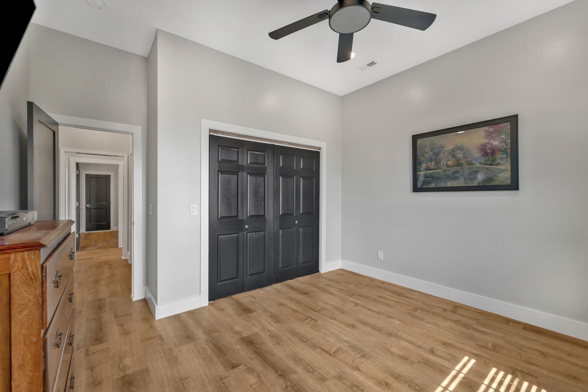 11010 Shelbyville Road Morrison, TN 37357 - Photo 19 of 44 a view of empty room with wooden floor