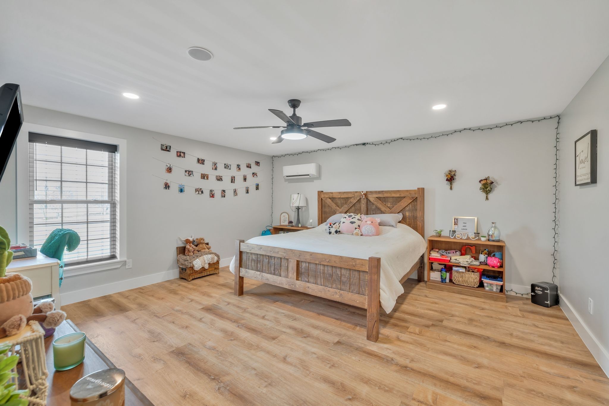 11010 Shelbyville Road Morrison, TN 37357 - Photo 25 of 44 a bedroom with a bed and wooden floor
