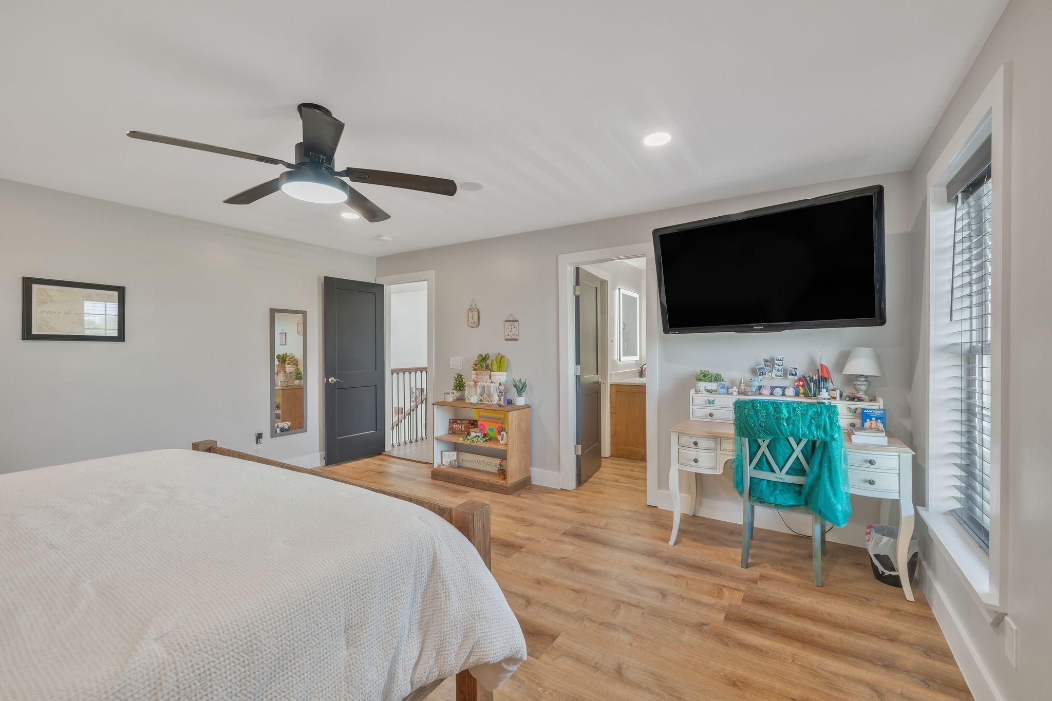 11010 Shelbyville Road Morrison, TN 37357 - Photo 26 of 44 a bedroom with furniture and a flat screen tv