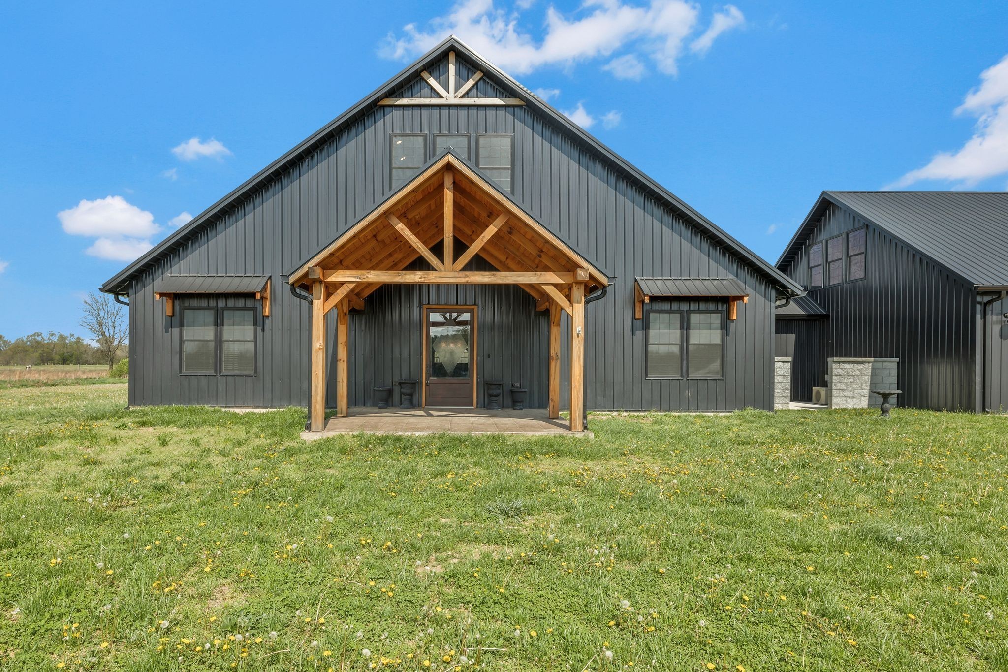 11010 Shelbyville Road Morrison, TN 37357 - Photo 3 of 44 a front view of a house with a yard