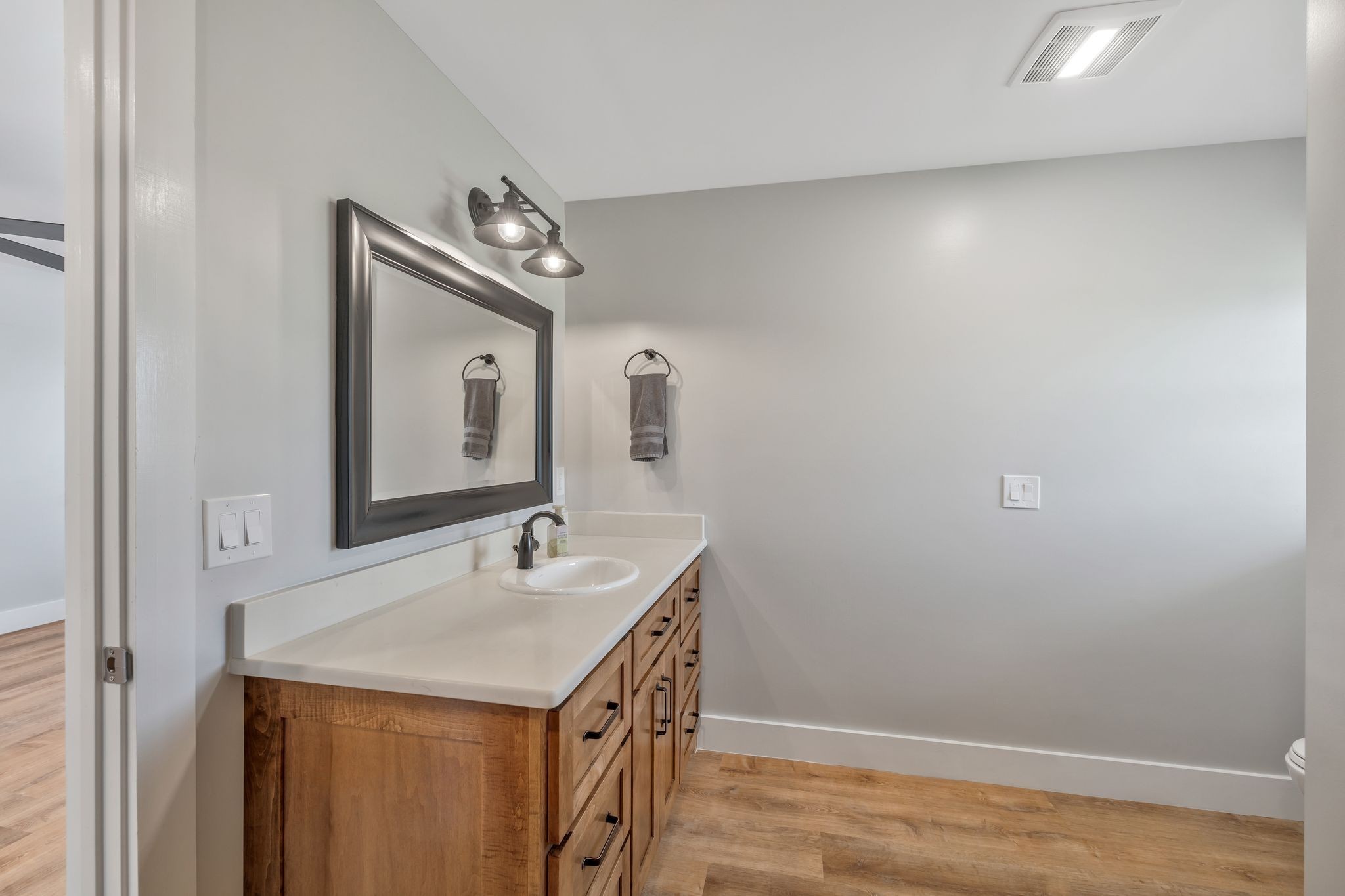 11010 Shelbyville Road Morrison, TN 37357 - Photo 31 of 44 a bathroom with a sink a vanity and a mirror