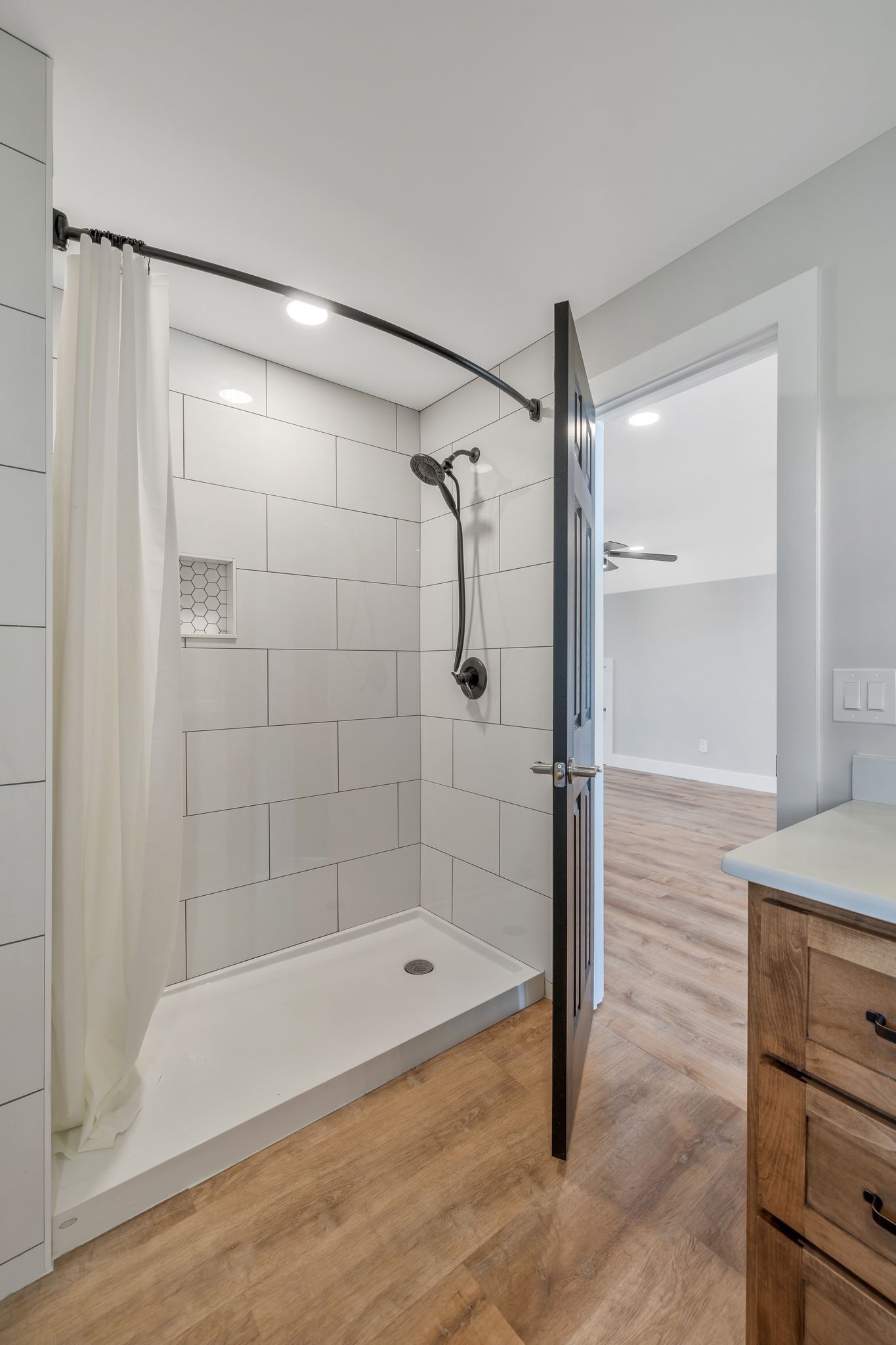 11010 Shelbyville Road Morrison, TN 37357 - Photo 32 of 44 a bathroom with a bathtub and a shower