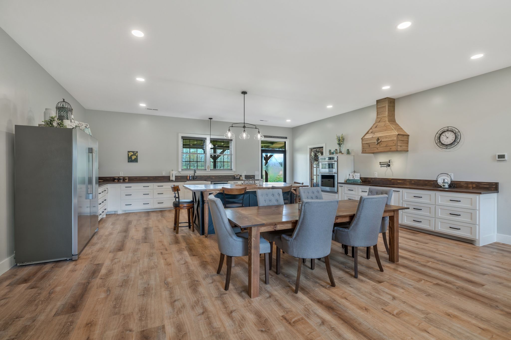 11010 Shelbyville Road Morrison, TN 37357 - Photo 10 of 44 a view of a dining room with furniture window and wooden floor