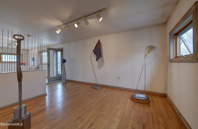 a view of livingroom with furniture and windows