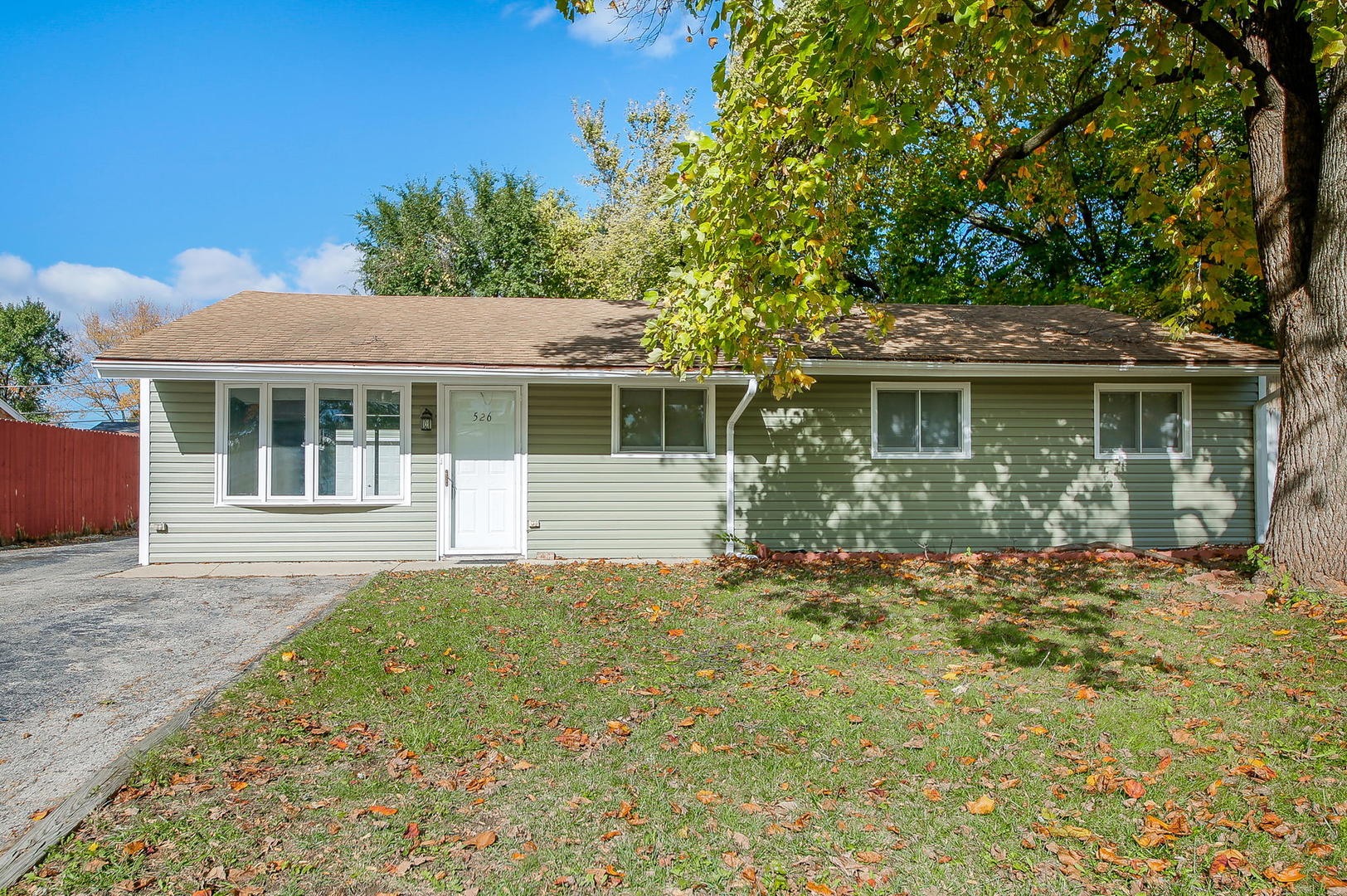 526 White Oak Road Bolingbrook, IL 60440 - Photo 1 of 18 a front view of a house with a garden