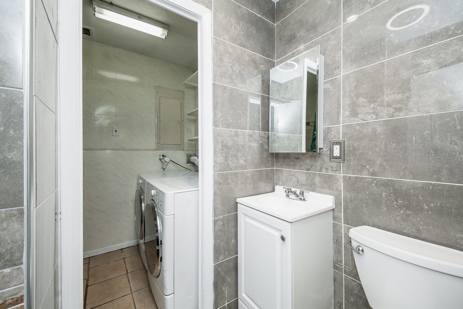 526 White Oak Road Bolingbrook, IL 60440 - Photo 13 of 18 a bathroom with a sink toilet and shower