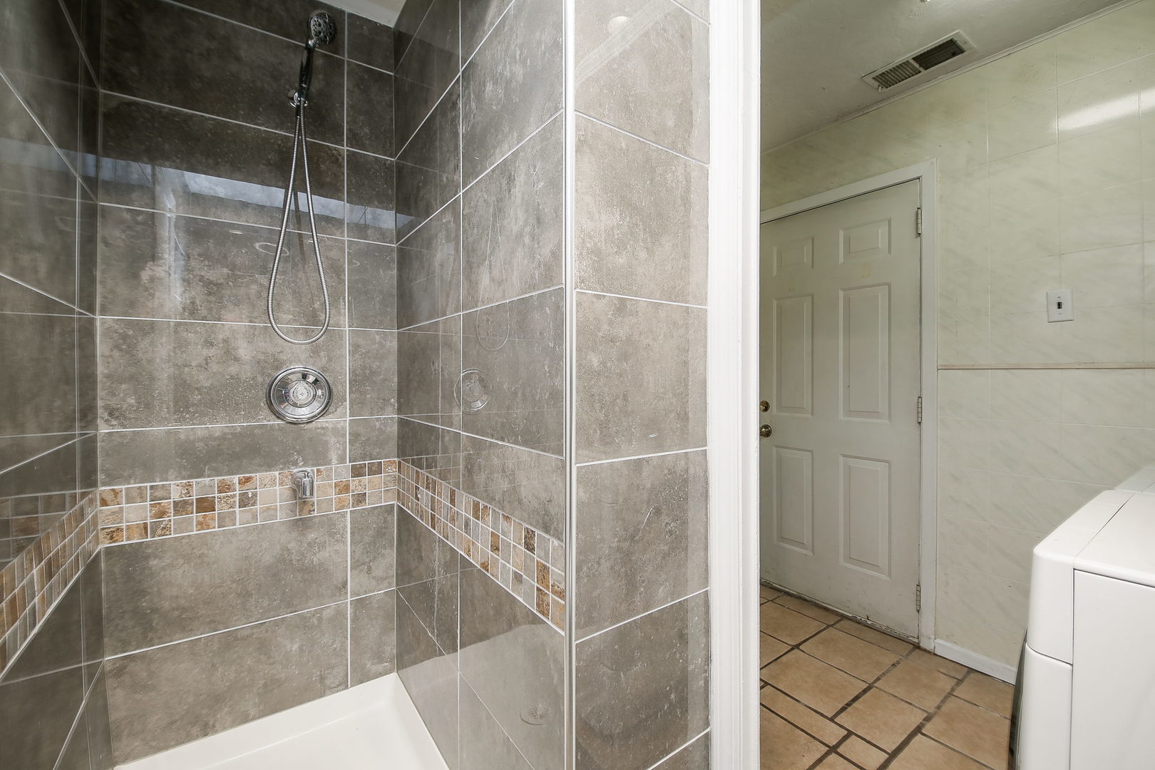 526 White Oak Road Bolingbrook, IL 60440 - Photo 14 of 18 a bathroom with a shower