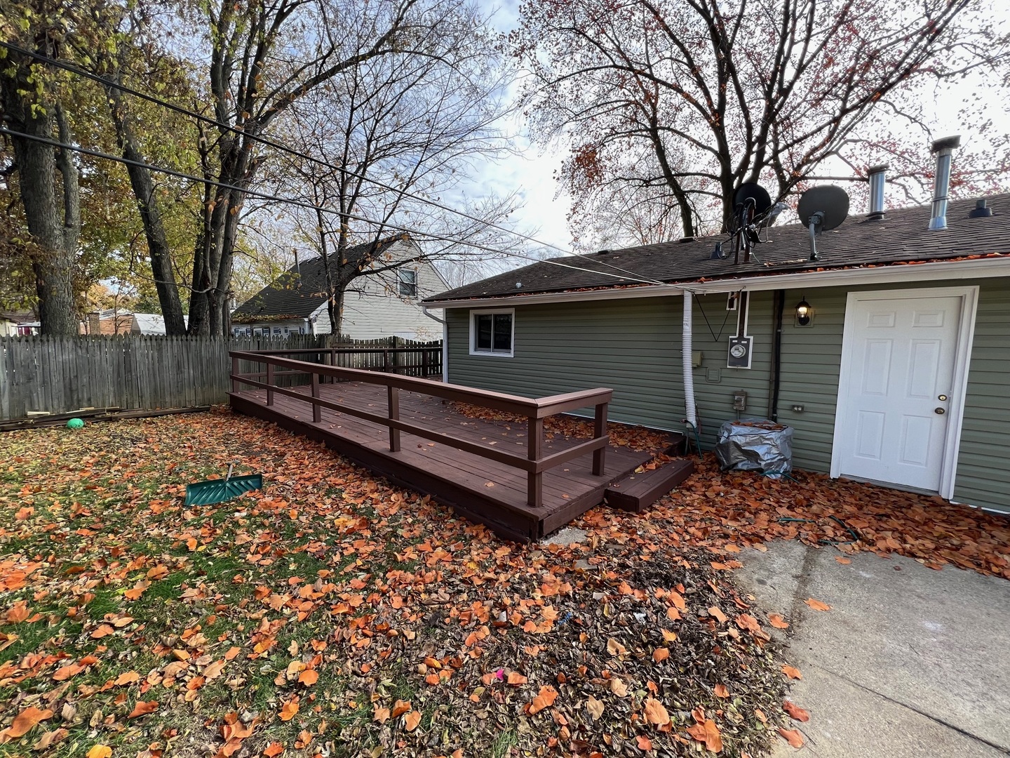 526 White Oak Road Bolingbrook, IL 60440 - Photo 17 of 18 a wooden bench sitting in middle of a yard