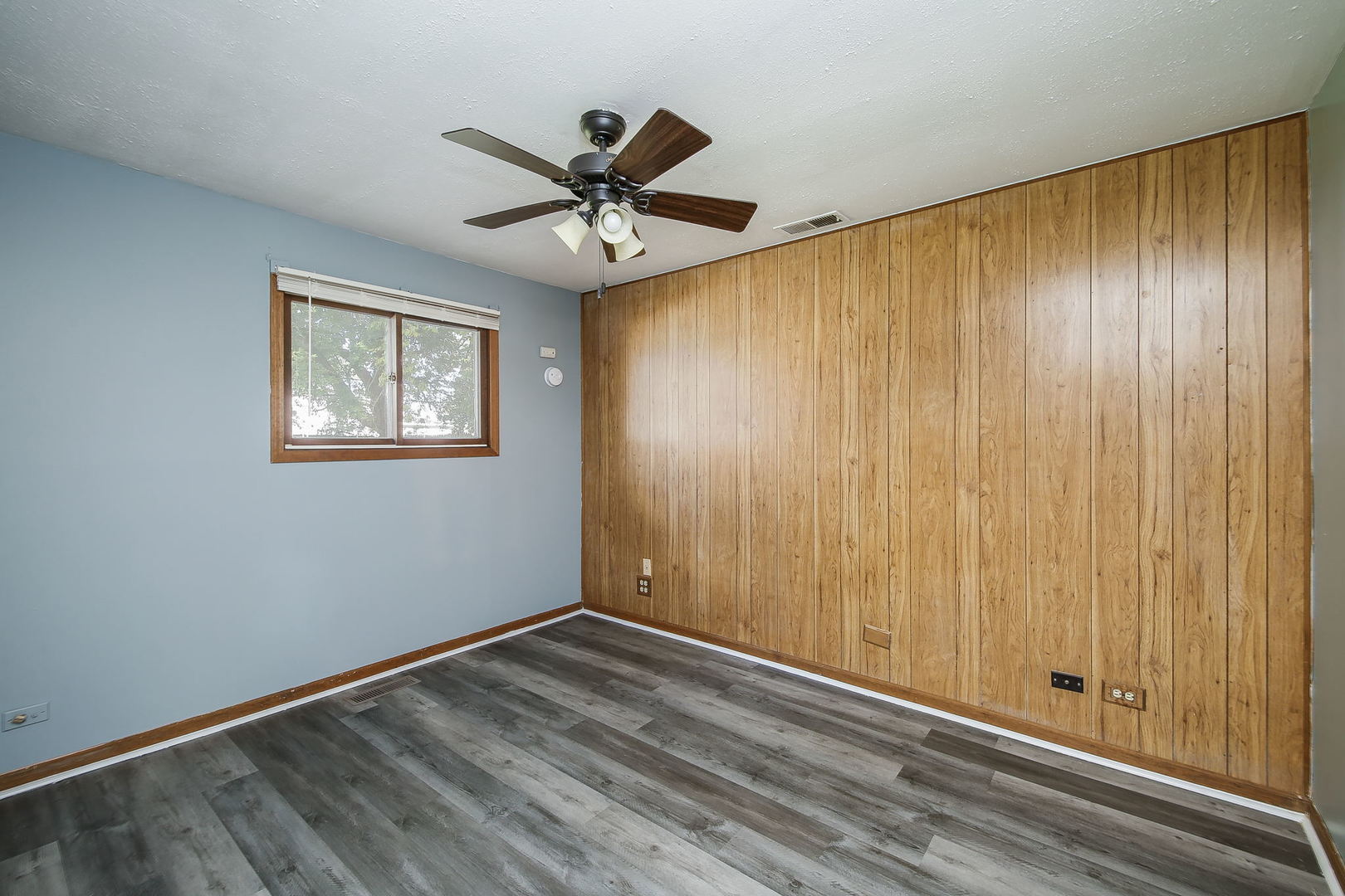 526 White Oak Road Bolingbrook, IL 60440 - Photo 8 of 18 wooden floor in an empty room with a window