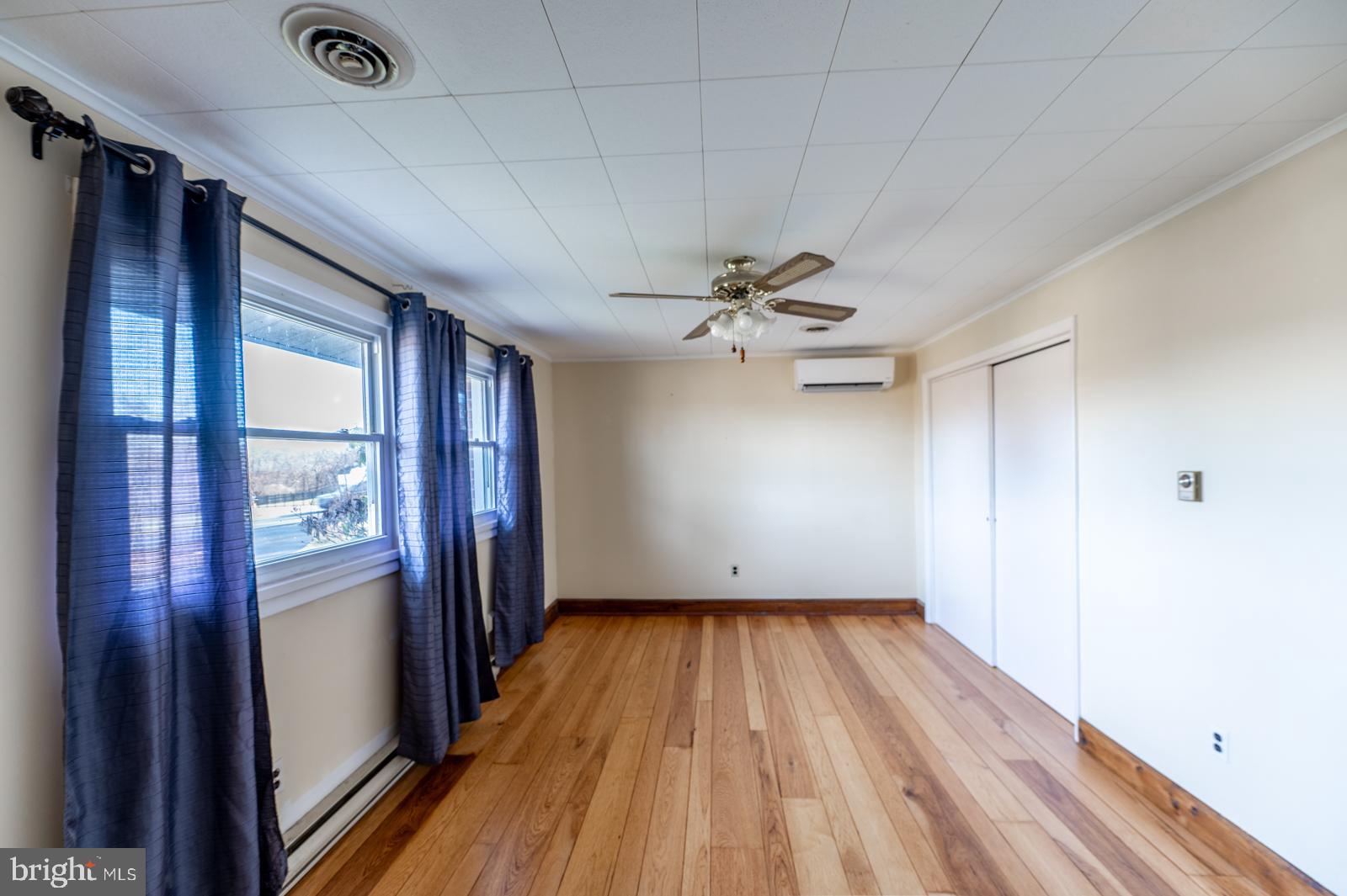 929 North Manor Road Honey Brook, PA 19344 - Photo 17 of 56 a view of empty room with wooden floor and fan