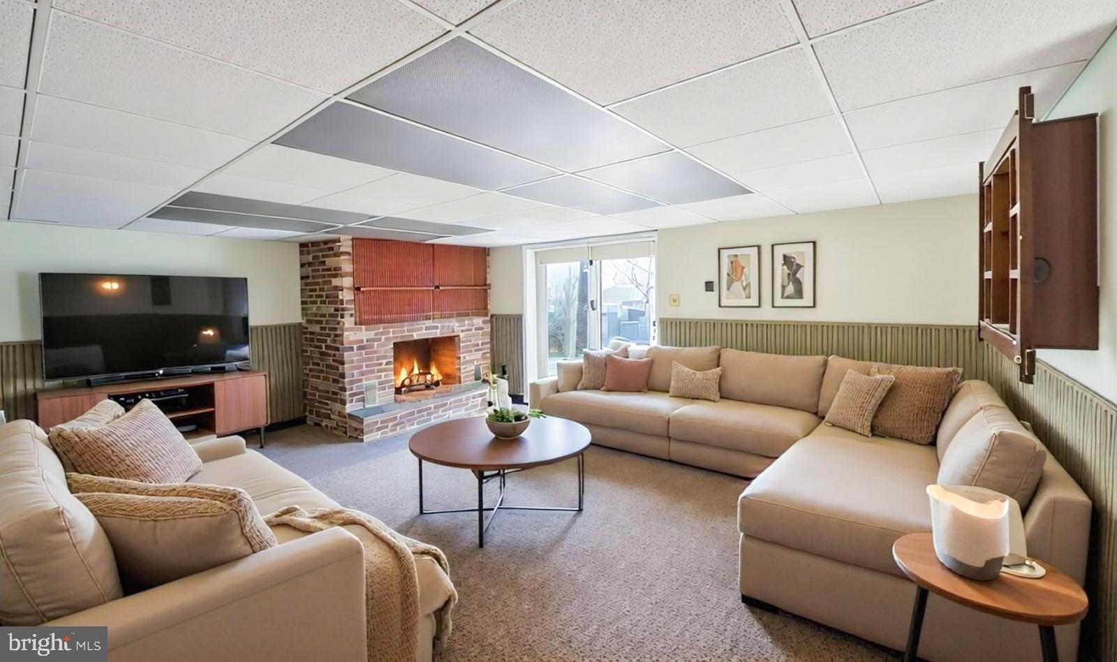 929 North Manor Road Honey Brook, PA 19344 - Photo 24 of 56 a living room with furniture and a flat screen tv