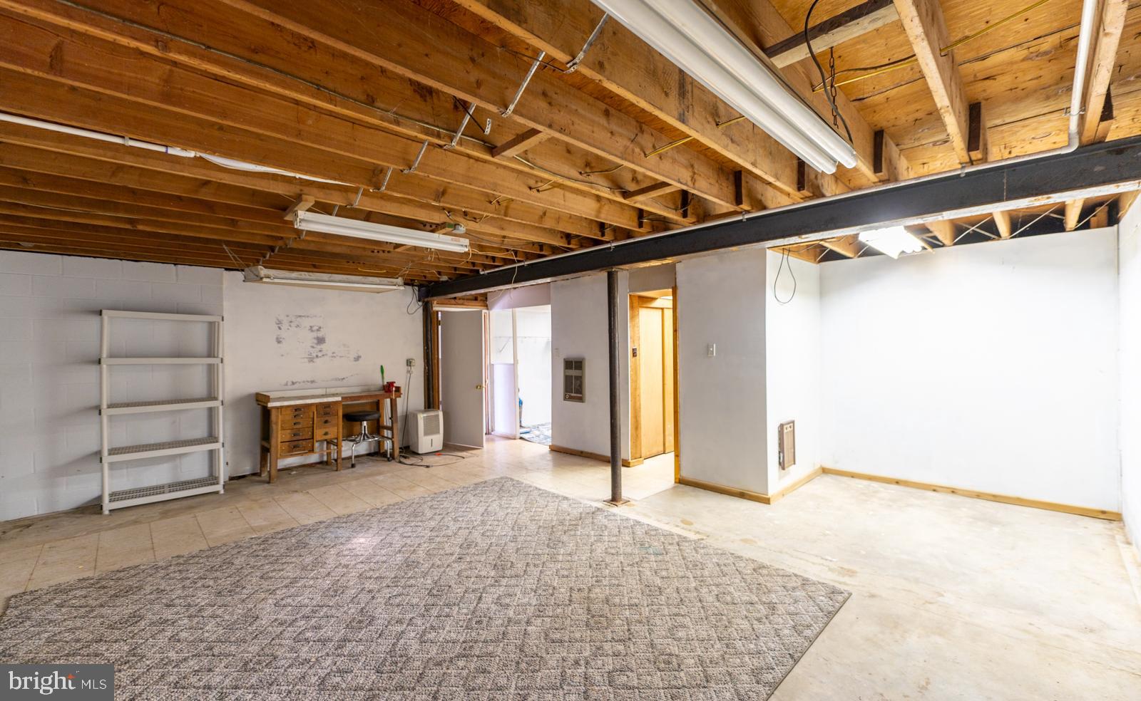 929 North Manor Road Honey Brook, PA 19344 - Photo 30 of 56 a view of a room with an empty space and a fireplace