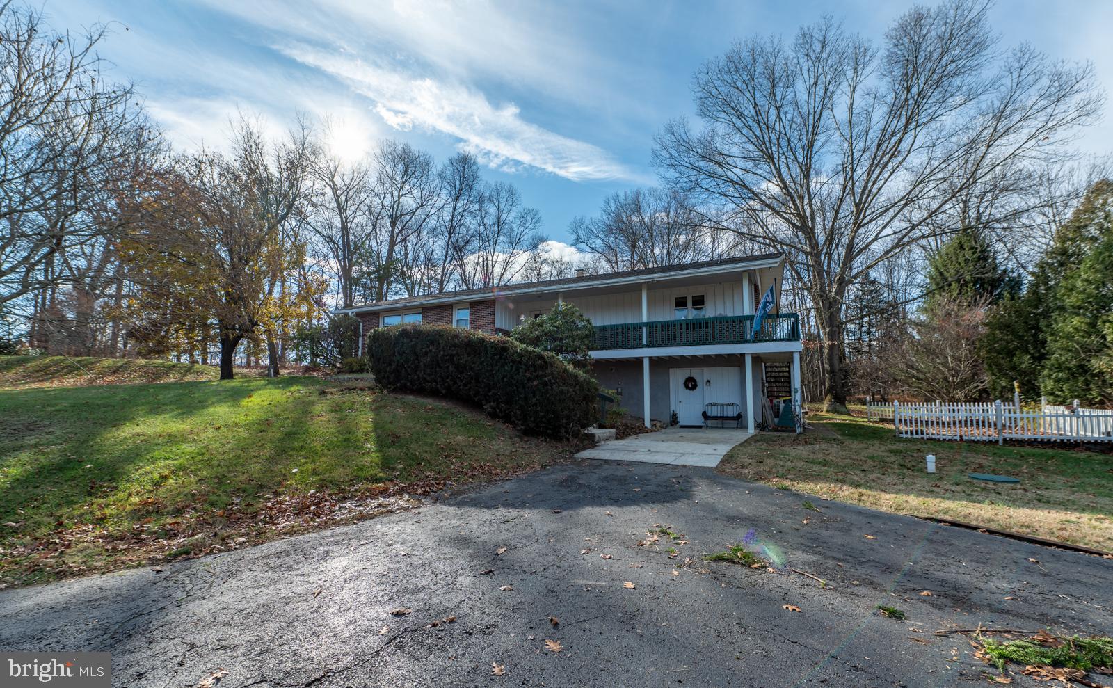 929 North Manor Road Honey Brook, PA 19344 - Photo 44 of 56 a front view of a house with garden