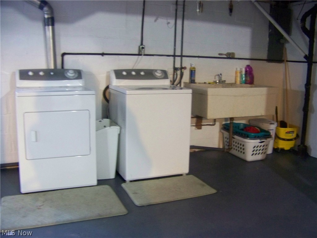 416 Ewing Road Youngstown, OH 44512 - Photo 32 of 34 LAUNDRY AREA WITH UTILITY SINK