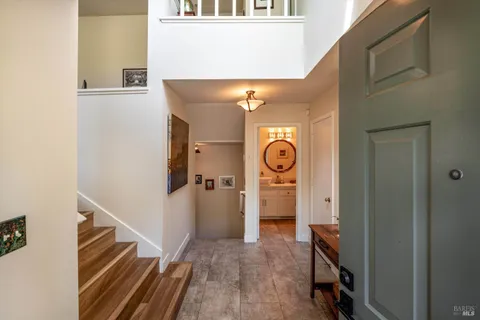 a view of entryway with wooden floor