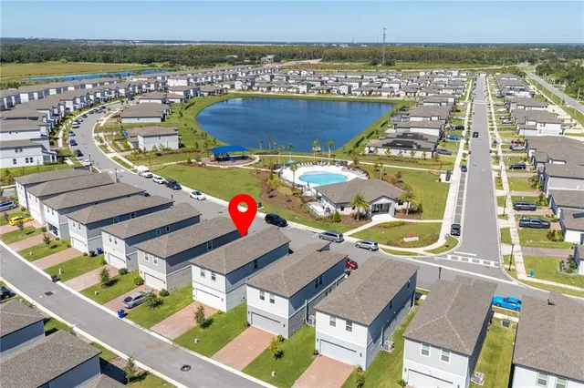 a view of swimming pool with a balcony