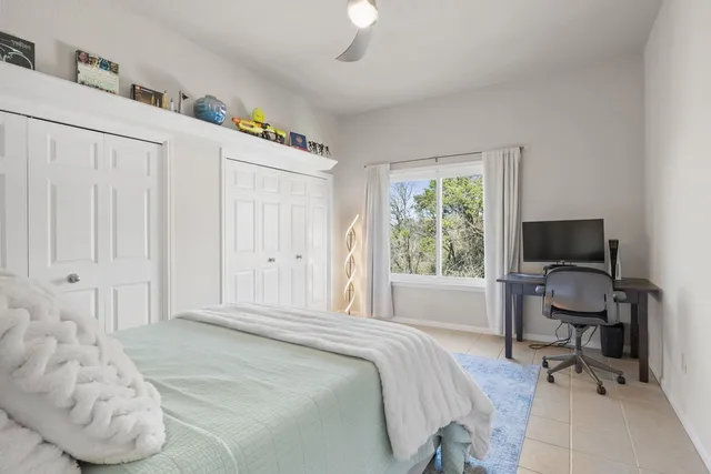 a workspace with furniture and chandelier