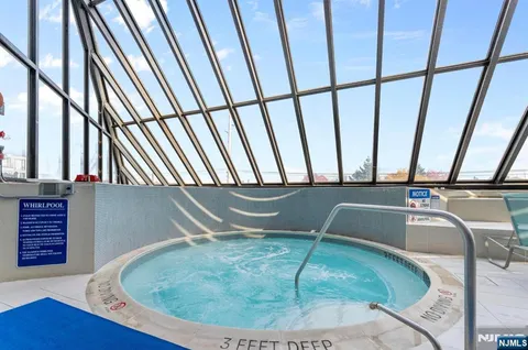 a view of room with wooden floor