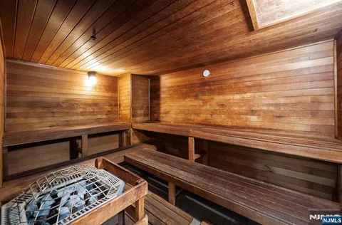 a room with lots of furniture and clutter