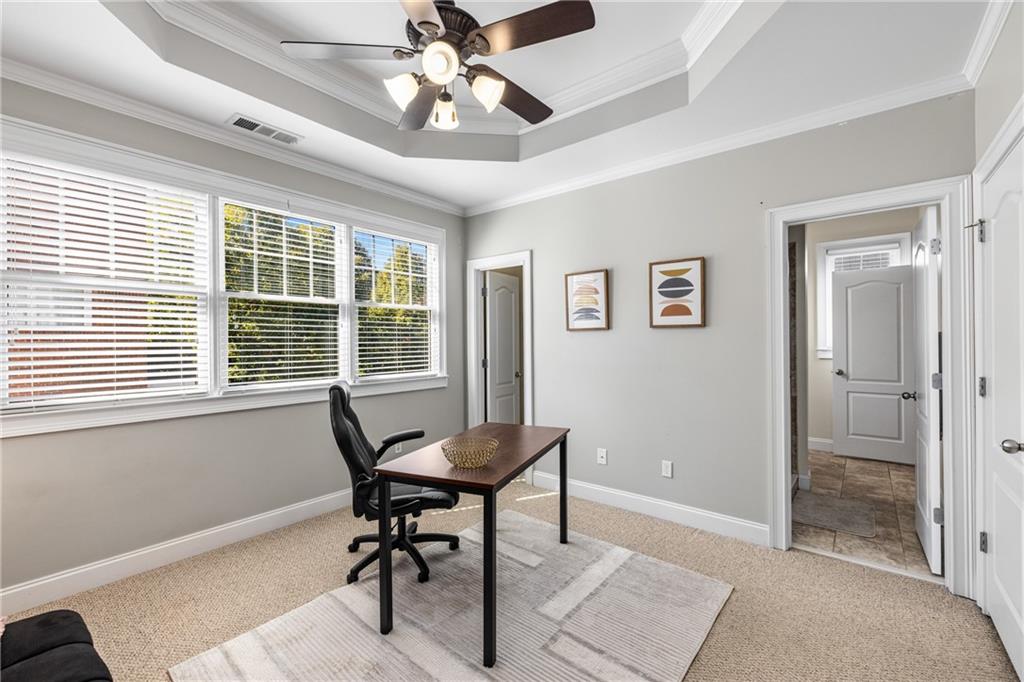 1258 DeKalb Avenue Northeast, Unit 135 Atlanta, GA 30307 - Photo 19 of 45 a view of a dining room with furniture window and wooden floor