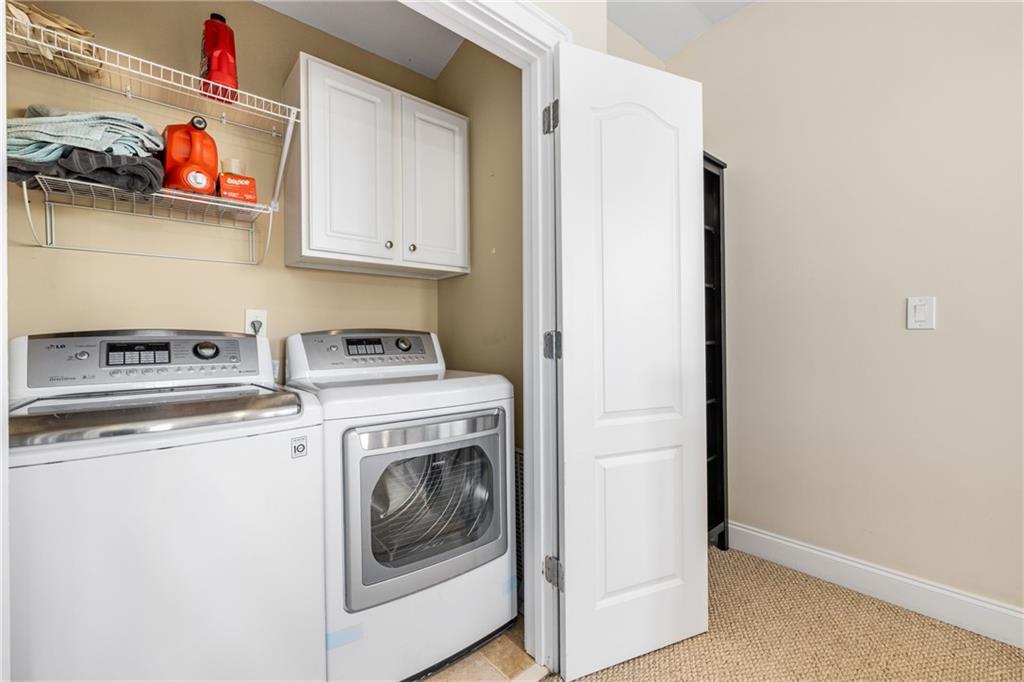 1258 DeKalb Avenue Northeast, Unit 135 Atlanta, GA 30307 - Photo 28 of 45 a utility room with dryer and washer