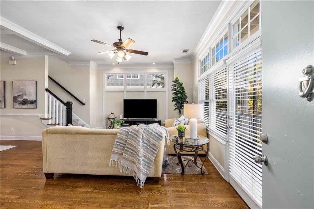 1258 DeKalb Avenue Northeast, Unit 135 Atlanta, GA 30307 - Photo 9 of 45 a living room with furniture and a fireplace