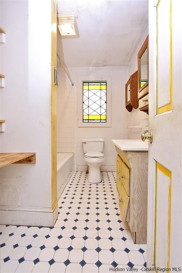 32 Barberry Road Kingston, NY 12401 - Photo 14 of 31 a bathroom with a sink a toilet a mirror and shower