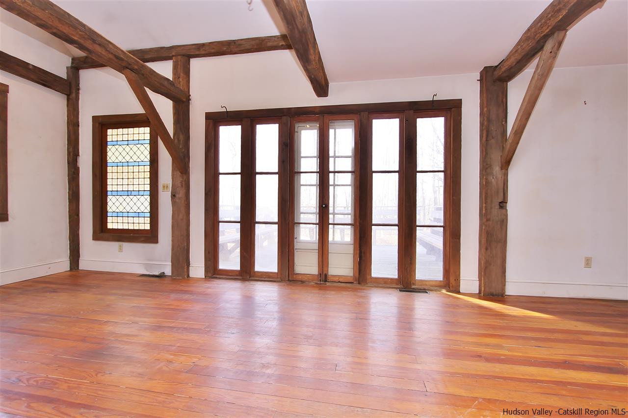 32 Barberry Road Kingston, NY 12401 - Photo 6 of 31 wooden floor in an empty room with a window