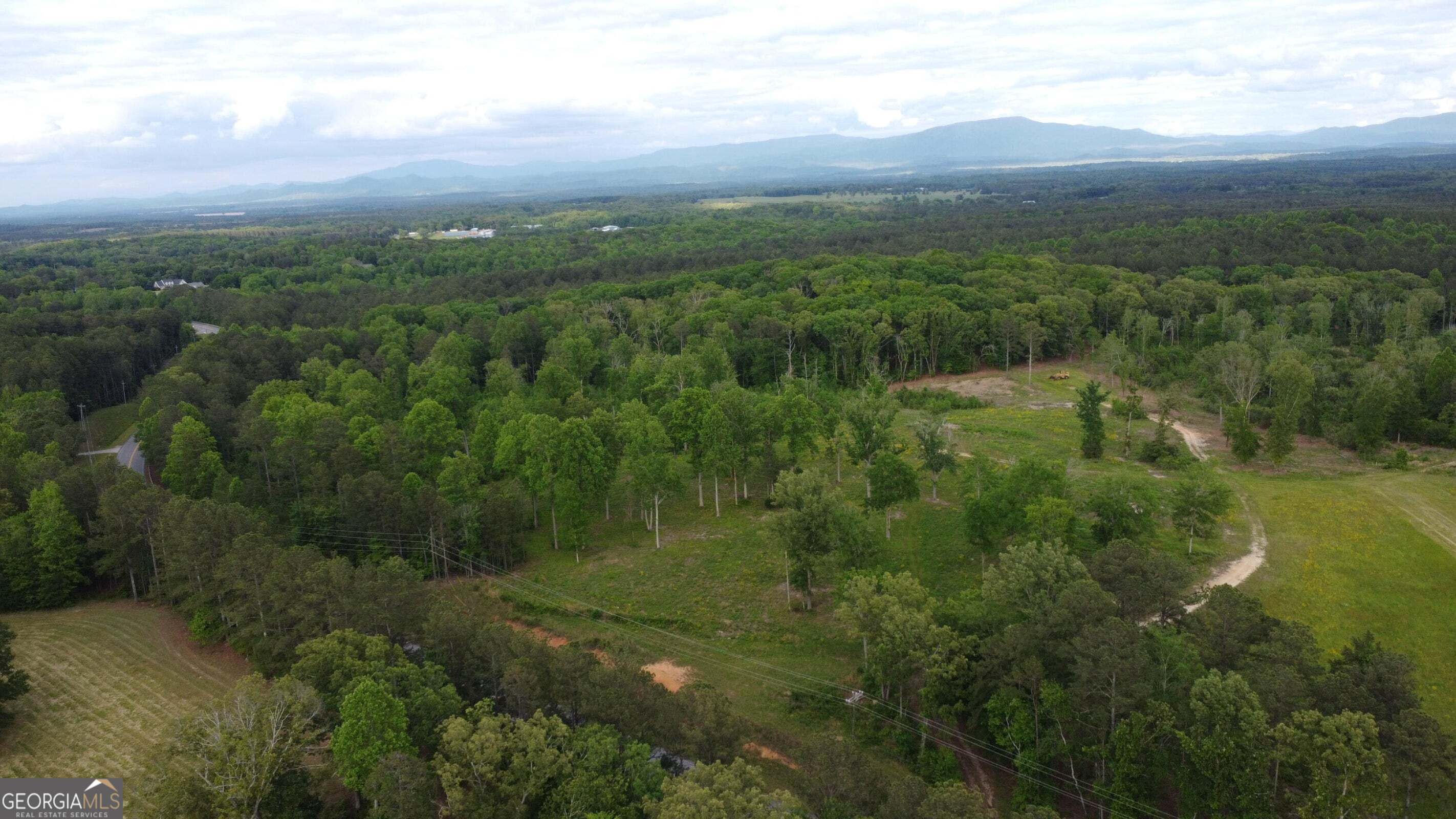 -tract 5 Highway 2 Dalton, GA 30721 - Photo 29 of 36 a view of a city with lush green forest