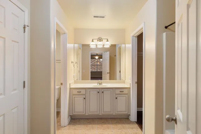 a view of a hallway with windows