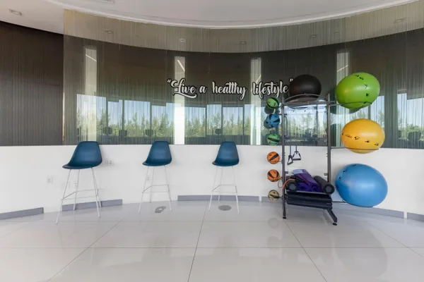 a view of a room with gym equipment
