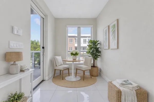 a view of balcony with furniture
