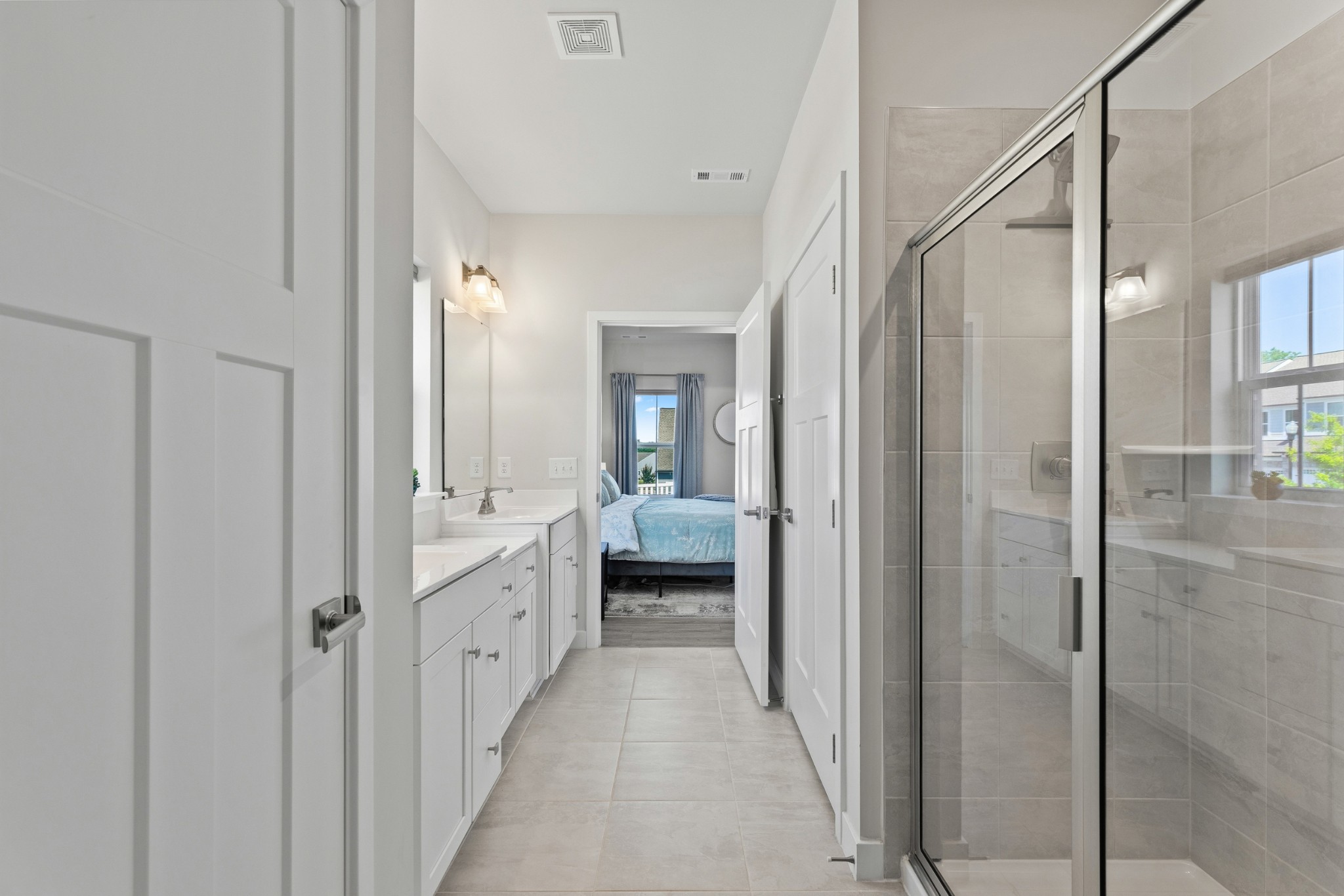 203 Pitchfork Way Gallatin, TN 37066 - Photo 27 of 39 a bathroom with a double vanity sink and mirror