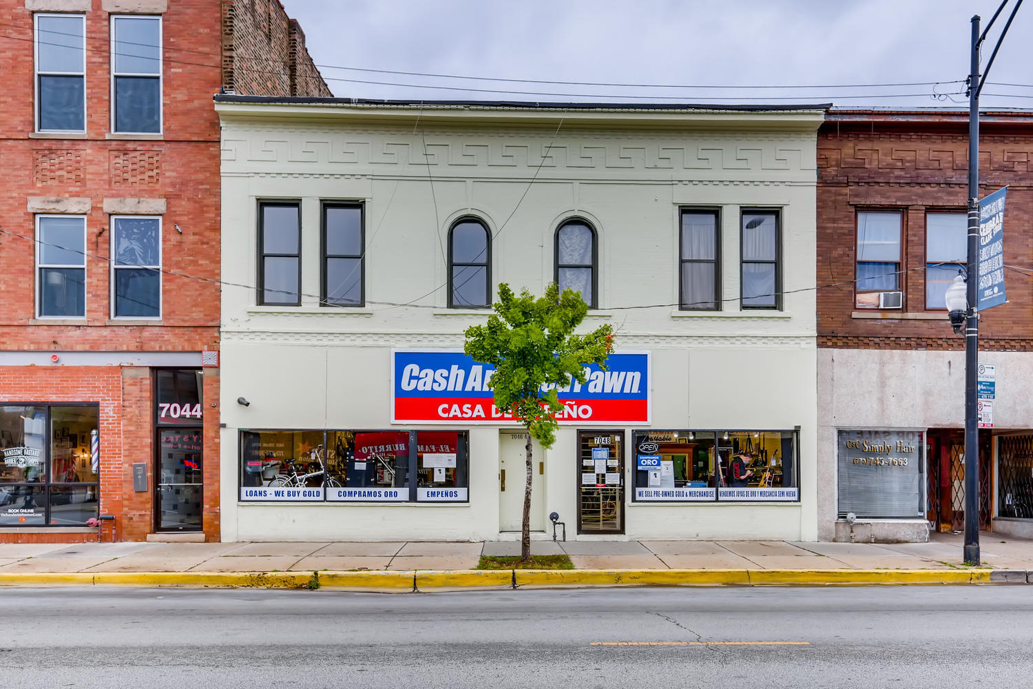 a front view of a building with street