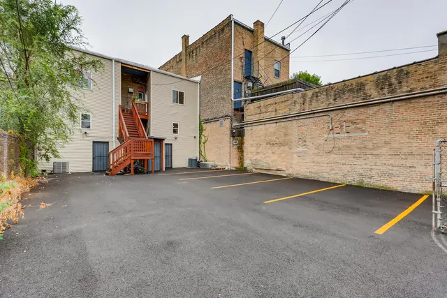 a view of a house with a street