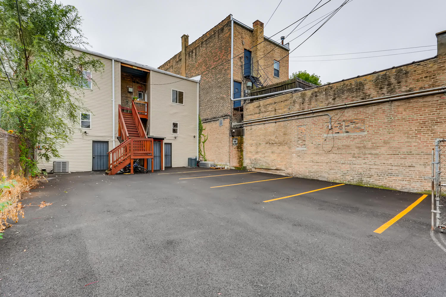 7046 North Clark Street, Unit 2 Chicago, IL 60626 - Photo 11 of 11 a view of a house with a street
