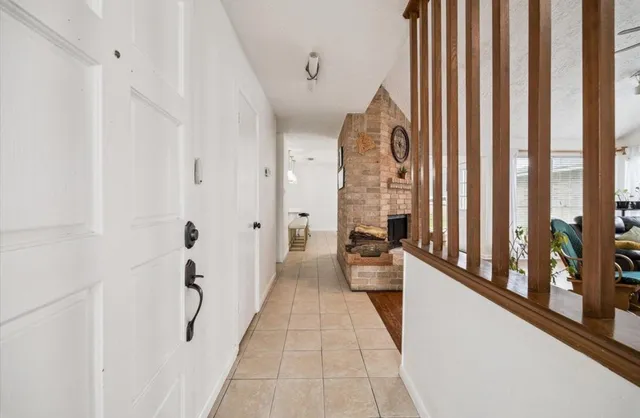 a very nice looking room with a large window and a shower