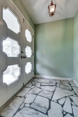 an empty room with windows