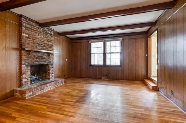 a bathroom with a granite countertop sink toilet and bathtub