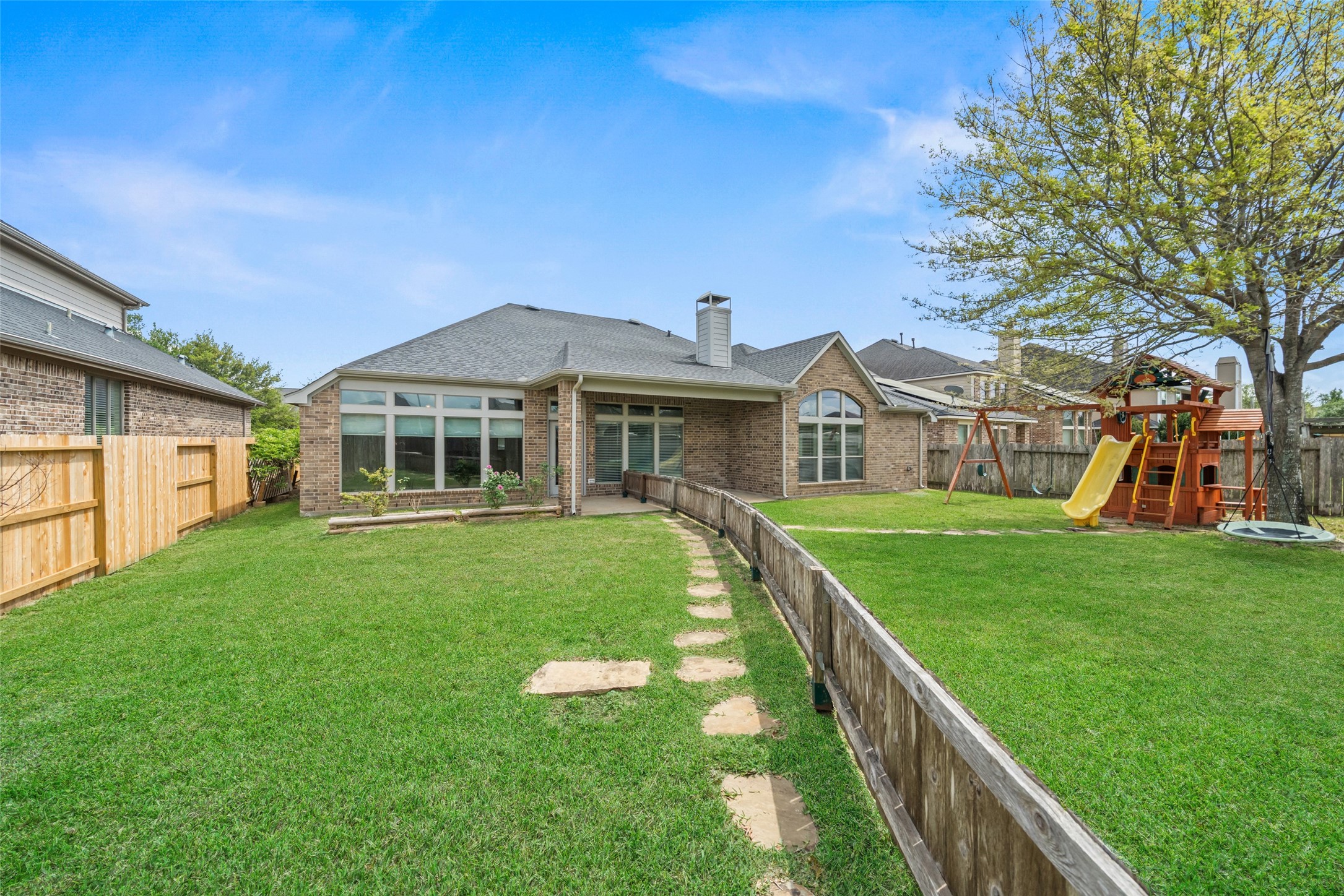 2818 Red Maple Drive Katy, TX 77494 - Photo 43 of 50 a front view of house with yard and green space