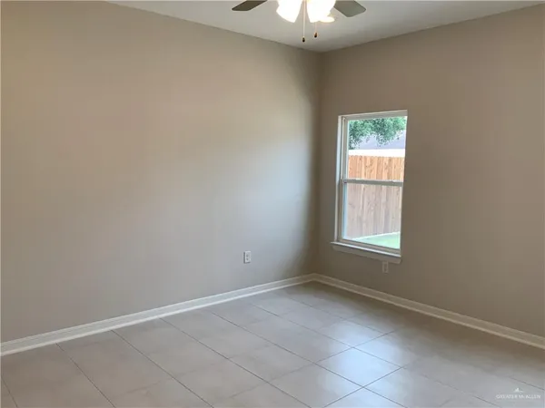 a view of a bathroom from a hallway