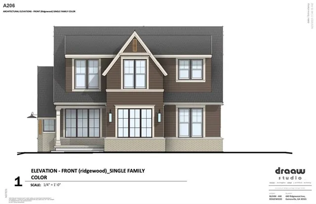 a black and white photo of a house