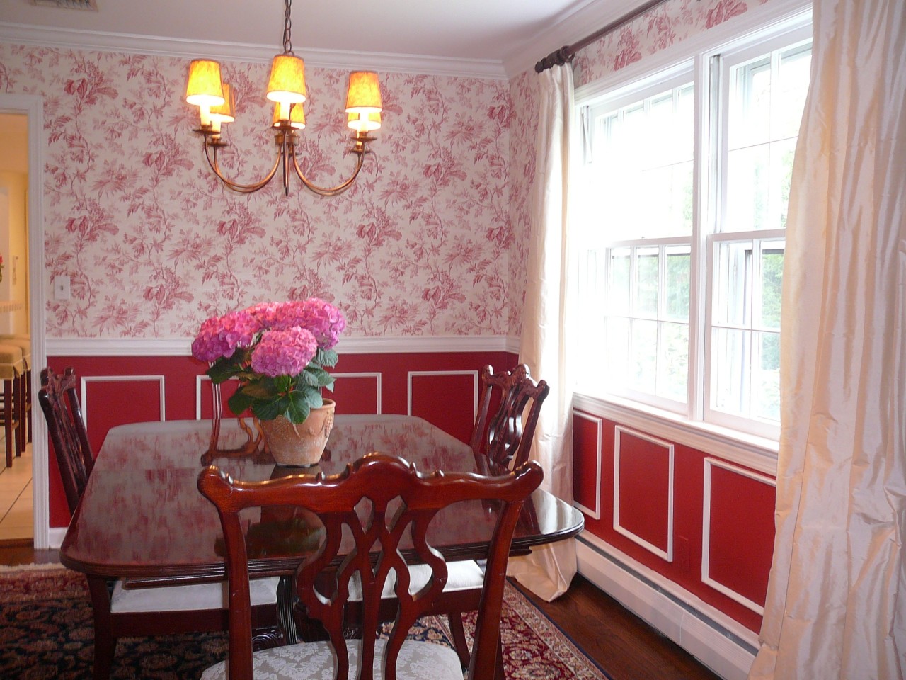 10 Silver Ridge Road New Canaan, CT 06840 - Photo 7 of 15 a view of a dining room with furniture a chandelier and wooden floor