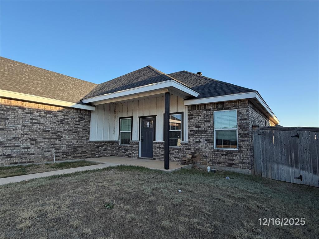 149 Spring Park Way Abilene, TX 79602 - Photo 2 of 2 a front view of a house with garden