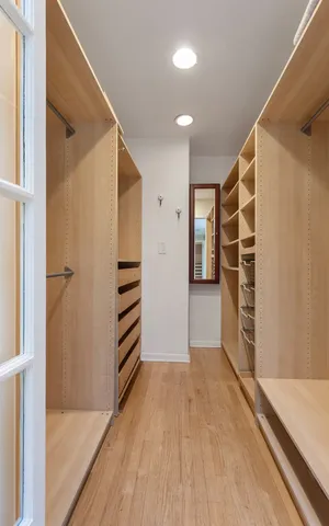 a view of living room with granite countertop furniture and wooden floor